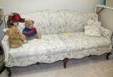 Lovely Queen Anne Style Sofa with nicely carved wood accents, and floral pattern upholstery. Also matching pillows. Stuffed teddy bears are also available.