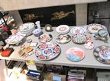 Nice Selection of Decorator Plates...Edna Hibel, lmari, Italian plates / wares. Books and other items pictured are also available.