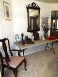 Elegant Mahogany Federal Style Wall Mirror with ornately carved pediments; also shown is one of the Penna. House mahogany Dining Arm Chairs which are matcing to the other  dining chairs...dining table, china cabinet and server which are pictured elsewhere in this collection;Other items pictured (other than the folding table) are also available.