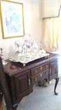 Pennsylvania House Mahogany Queen Anne Style Server with Padded Feet, double doors and drawers storage.  Server is part of matching  Dining Room Set  by Pennsylvania House...includes Queen Anne Style  Dining Table with mahogany finish, 2 extra leaves, and with table pads, 6 matching Queen Anne Style Dining Chairs with padded feet (2 Arm Chairs and 4 Side Chairs); Matching Pennsylvania House lighted China Cabinet with 4 glass & wood doors with brass pulls in the upper section, and lots of storage / display/ storage in drawers and door storage; Matching Pennsylvania House Server with Double door and drawers storage; Also shown are some of the excellent collection of silverplate tea service, entertaining and serving items that are in this sale...many appear to be by  Sheridan and also appear to be silverplate over copper.