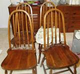 Four Matching Spindled High Back Chairs with light finish