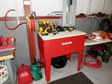 Graymills solvent washer / soak tank...Model Pl 36. 15 gal tank with bottom drain,sloped work shelf, parts basket; Also shown are some of the power tools available in this sale...Makita battery powered drills; air hose reel & air hoses are also available
