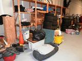 Some of the Storage Shelf Units that are available in this sale. Wet Dry Vacs, tires, tire rack, and other items shown are also available.