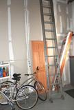 Aluminum Extension Ladder; Two (2) Huffy Innsbruck Bicycles...one man's and one woman's...multiple speed ranges;