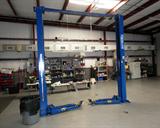 Two Post Car Lift Mfg by Forward Lift...Overhead Style 2 post car lift, Model DP97A, 9000 lb capacity; 2 hp