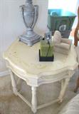 Italian Provincial Style table with sculpted top and spindled legs. White finish.