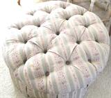 Tufted Ottoman with pastel colored upholstery