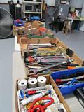 Some of the hand tools available in this sale...wrenches, good selection of sizes in socket sets...many in like new condition...other items shown including the large floor fan and jacks...everything displayed on our tables... but not our display tables, are available.