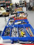 Some of the hand tools available in this sale...wrenches in many sizes, other tools many in like new condition...other items shown including the large floor fan, and the open shelf display storage shelf units...everything displayed on our tables... but not our display tables, are available.