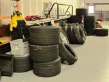 Some of the tires...racing slicks, others, that are available in this sale; Also available are the Simms Motor Racing Shirts pictured