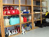 Good variety of fuel and other cans used by the Simms Racing team; Jack stands, jacks, lots of good heavy duty totes, some Simms Racing shirts and the wood shelf storage units are also available.