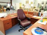 Large Contoured U Shaped Desk / Work Center...modular with hutch (seen sitting on the floor behind the desk & chair),and connecting bridge...lots of drawer file & other storage. Maple finish. High back Executive Chair is also available. Other items shown on the desk top are also available...including the All-in-one printer.