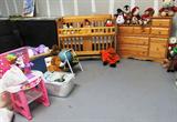 Got a need for some baby furniture? How about this Baby Changing Tower Table with lots of drawer storage...pine with light finish...or how about the matching Convertible Crib also shown. The Convertible Crib is mfg. by Crib 4 Life and it converts as your baby grows from a crib to day bed to a full size bed but it will continue to be a stylish piece of furniture over the years. Also shown are some of the large collection of stuffed animals and toys, and also shown is a Child's Barbie Play set.