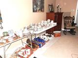 Excellent China in this sale..many are vintage...Large sets... Johnson Brothers, Haviland Limoge, Noritake, Imperial China, Staffordshire English China, others in smaller sets too; The Vintage  Haviland Limoge china set alone has 107 pcs including large serving pieces which are unusual to be found in a vintage set like it is.   Also pictured is a vintage high backed oversized rocking chair with nice stencil accents; Also pictured is a  entertainment center with glass & wood door & Open shelf storage;  Artworks and accent candle holders and whimsical time piece are also available.