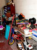As you can see the garage is packed with things...power and hand tools, 2 child's Huffy Rocket Bicycles, Motorcycle helmet, lots of handyman   u'sort 'em boxes, tiles, and if you are a crafter...lots of crafting supplies...including boxes of stained glass supplies waiting for your artistic touch to create a masterpiece...  this garage is so packed even the duck had to move to higher ground so he could take off...or watch the actions of our team... but he won't be there for long because that bookcase he is sitting on is also for sale.