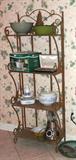 Ornate Metal  Bakers Rack with 4 open style storage shelves; Also shown are a White - Westinghouse rice cooker, and a retro look Oster food processor which  are also available as are the dishes and the Towle Knife Set