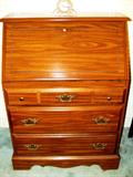 Nice  Drop Front Secretary / Desk...with drop down front for writing, also storage shelves inside, 3 drawers with brass pulls, and rich finish.