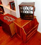 Vintage End Tables with Storage...One has Magazine Rack and door storage... the other Vintage Storage Cabinet has door storage, and a magazine rack feature inside the cabinet.  It also has a pull out writing  for your late night reminder note writing...or if you wish...late night snack caddy; Also shown is a Vintage Wine Rack Display in a retro style wood crate with brass handles...display / storage  for 9 of your favorites. Also shown are some of the Hawaiian Style Necklaces that are available in this sale.