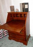 Nice  Drop Front Secretary / Desk...with drop down front for writing, also storage shelves inside, 3 drawers with brass pulls, and rich finish.
