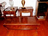 Elegant Vintage Drexel  Drop Leaf Coffee Table with fold down leaves, decorative legs with Spanish style feet, and beautiful rich mahogany finish; Also shown is an excellent Vintage set of Nesting Tables...two matching tables in set... each with nicely scalloped accented tops and nicely turned legs...and  rich looking mahogany finish;  Also shown is a Continental style end table with nicely carved Cabriolet style legs,  drawer storage and brass pulls...rich looking mahogany finish;  Also shown is a wood & glass Stereo/  entertainment cabinet with shelves. Audio / visual components shown are also available;   Vintage Accent Table Lamps shown are also available...one has a crystal base and the other has a brass base