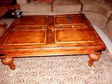 Large Square Coffee Table with beautiful worm wood and rich finish,   floral & fan carved accented top with a glass overlay, and nicely carved fluted legs.  Coffee Table is matching to two end tables and an armoire which are pictured elsewhere in this collection.