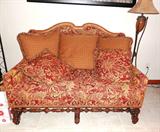 Beautiful Robb & Stucky Continental Style High Back Sofa with nicely carved, turned and spindled wood accents, beautiful Tan Leather accented top, and floral tapestry wine and gold upholstery and Brad Trim;   Accent Floor Lamp shown is not available.