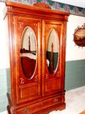 Stanley Furniture Armoire with rich finish, double oval mirrors, double door and drawer storage with brass pulls.  Armoire is matching to other Stanley Furniture Bedroom Furniture pictured elsewhere in this collection.