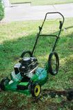 Weed Eater Self Propelled Lawn Mower with Briggs & Statton Engine. Oversized wheels