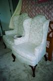 Matching Wing Back Occasional Chairs with Floral pattern Upholstery. Part of Living Room set. Other pieces to the living room set are pictured separately