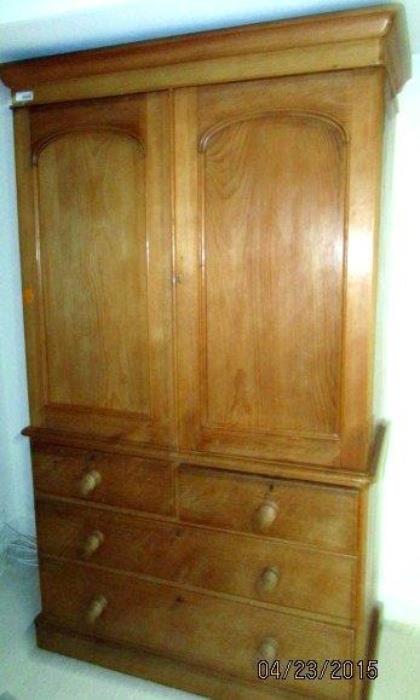 Beautiful 3 piece pine storage armoire with slide out storage shelves concealed by 2 upper doors and 2 over 2 lower drawers. Optional upper crown can be removed if you have a lower ceiling.
Measures:
81"H x 46"W x 21"D ( if you remove upper crown, 75"H)
