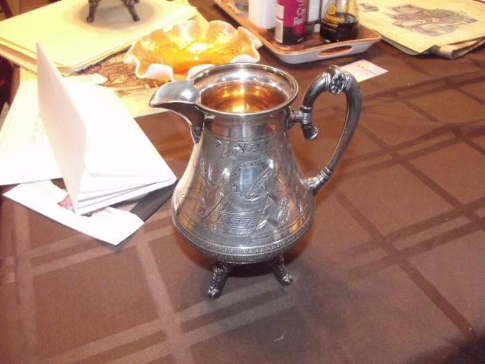 Engraved Silver Pitcher