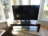 Flat screen T.V. with contemporary console
