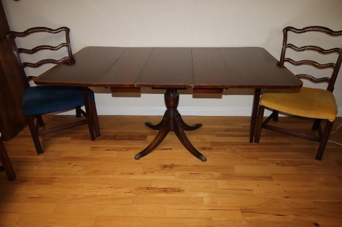 Mahogany Duncan Phyfe style table with leaves.