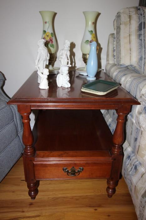 End table. matching oil lamps, porcelain figures.