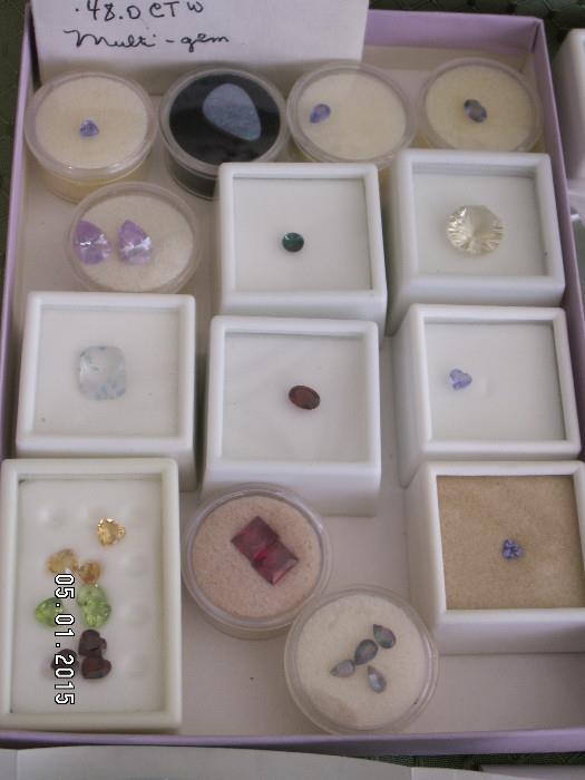 Unset precious and semiprecious stones - topaz, garnet, citrine, tanzanite, garnet, opal.