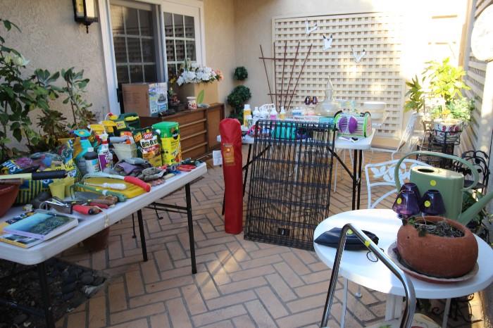 Plant food, fertilizer, folding chairs, patio sets, gardening tools. Bistro set. animal cage.