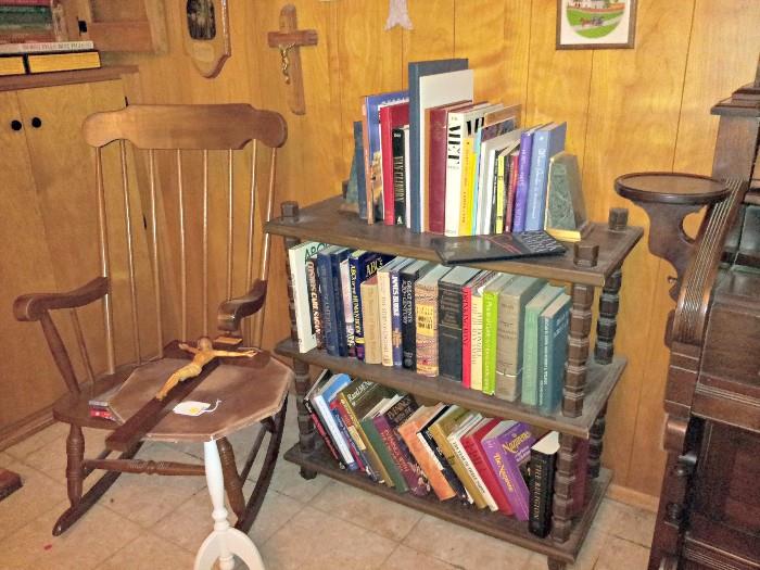 Vintage rocking chair, bookcase, books, small table