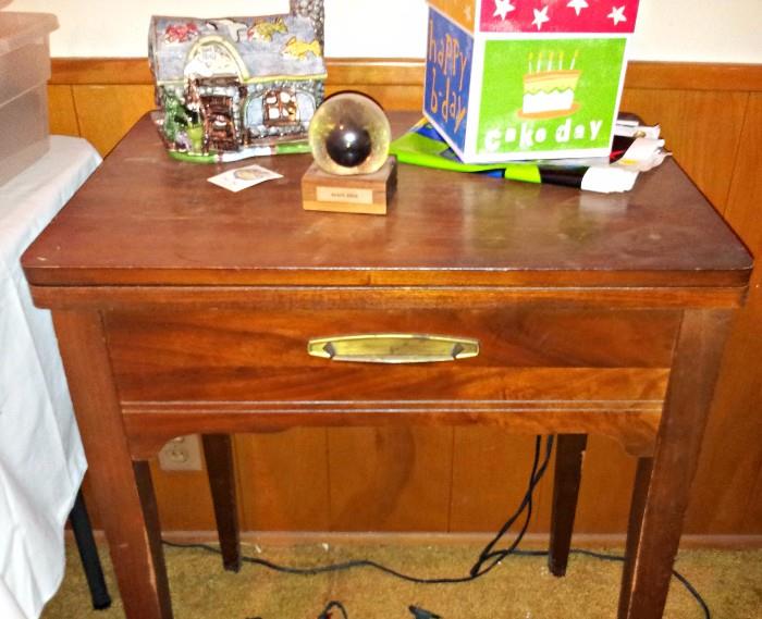 Vintage sewing cabinet with machine