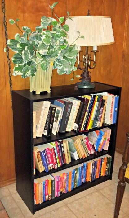 bookcase and paperback books