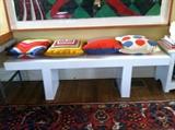 White contemporary bench, Jonathon Adler throw pillows, & rugs, etc.