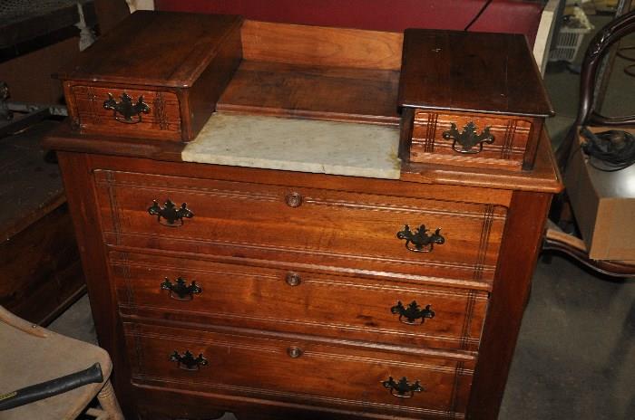 Sheridan cherry and mahogany dressers with marble top and bachelor's drawers.