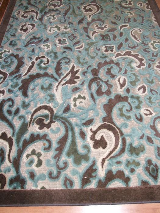 AREA RUG IN TEAL AND BROWN