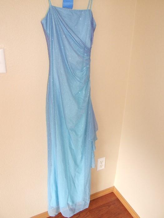 BLUE SEQUIN GOWN....VERY DETAILED. OTHER GOWNS AVAILABLE IN DIFFERENT STYLES AND COLORS TOO