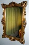 Wall Mirror in gold finish approximately 30" by 20"