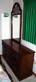 Dresser with Mirror in dark oak finish.