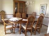 Dining room table, 8 chairs, 2 leaves and pads