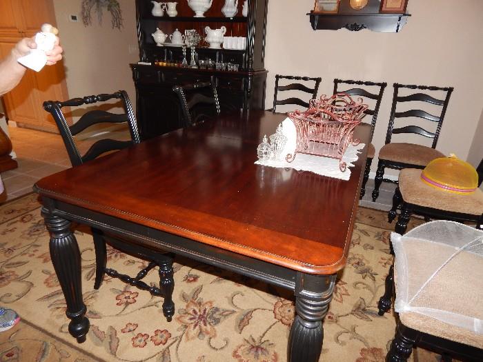 Incredible dining room set with 6 chairs (two captains), two leafs and cabinet