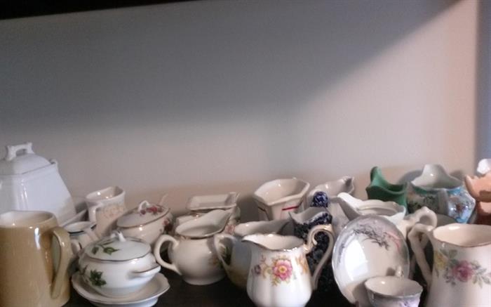 many different pieces of china