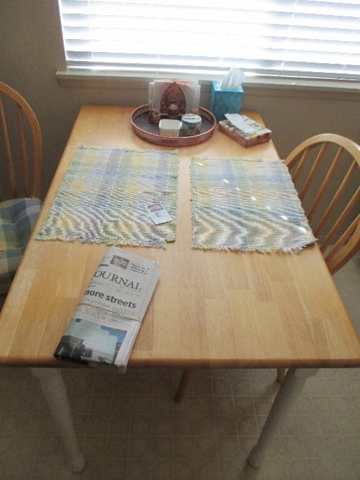 Cute, light wood kitchen table and chairs