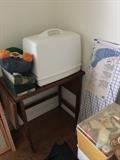 Sewing machine and table